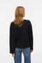 Back image of a model wearing the Vero moda hali l/s boat neck top in black, by brand Vero moda