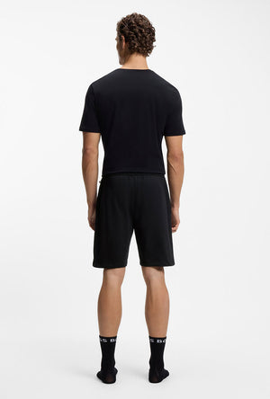 Back image of a model wearing the Boss authentic shorts in black, by brand Boss