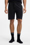 Front image of a model wearing Boss authentic shorts in black, by brand Boss
