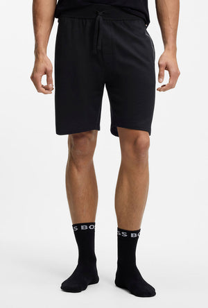 Front image of a model wearing the Boss authentic shorts in black, by brand Boss