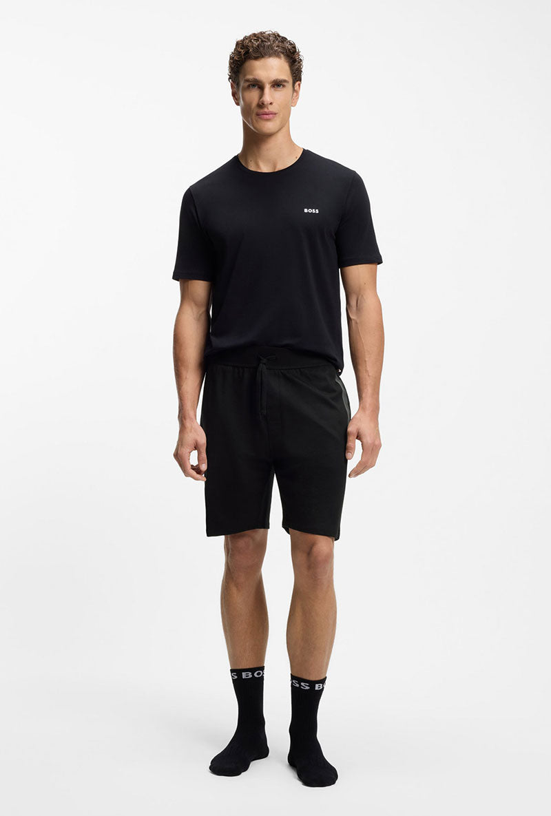 Front image of a model wearing Boss authentic shorts in black, by brand Boss