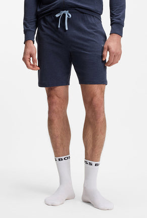 Front image of a model wearing Boss mix & match shorts in navy, by brand Boss