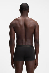 Back image of a model wearing the Boss one 3pk trunks in black, by brand Boss