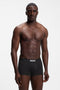 Front image of a model wearing Boss one 3pk trunks in black, by brand Boss