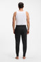 Back image of a model wearing the Authentic jogpants in black, by brand Boss