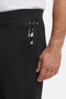 Front image of a model wearing the Authentic jogpants in black, by brand Boss