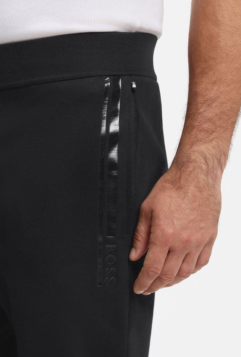 Front image of a model wearing Authentic jogpants in black, by brand Boss