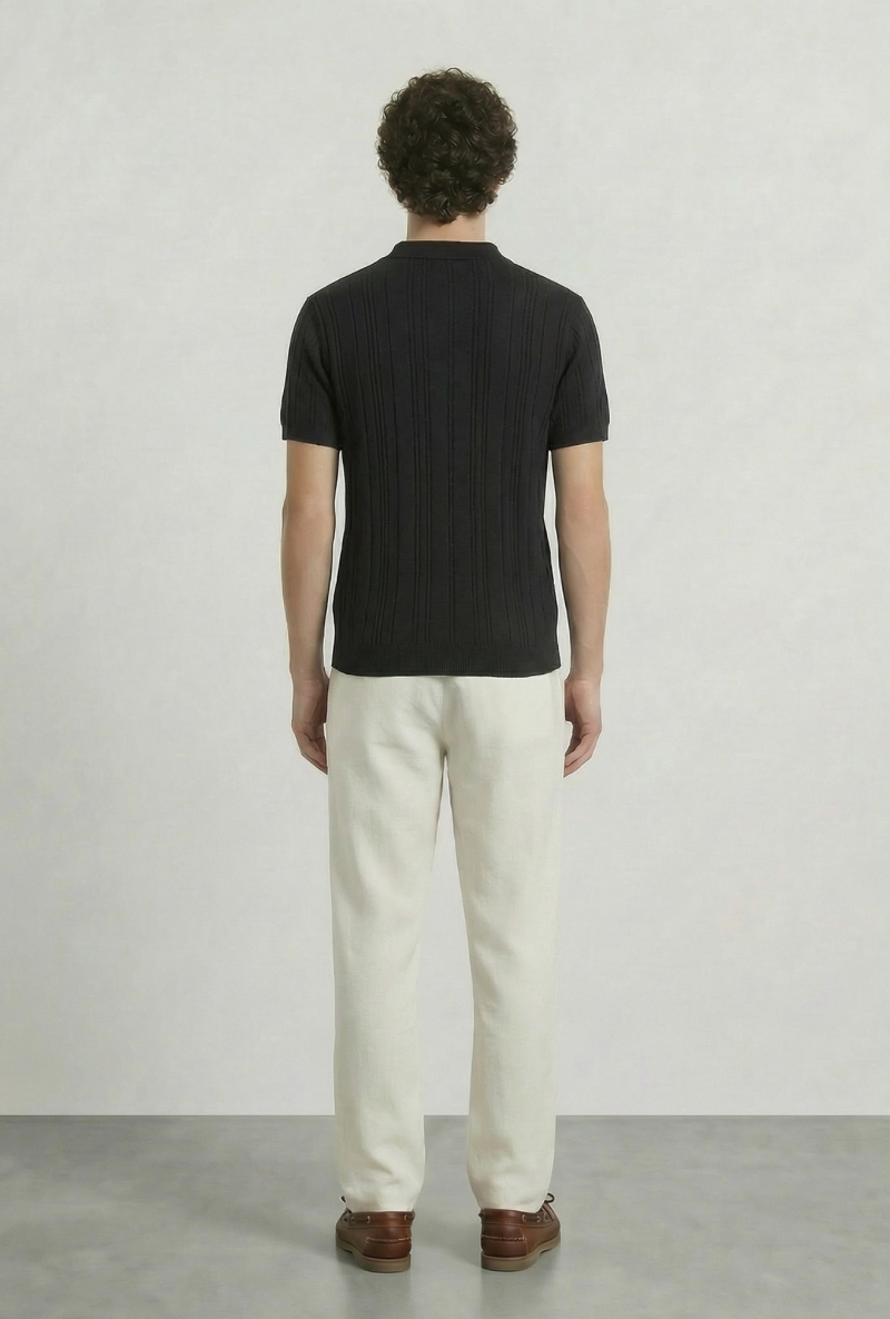 Back image of a model wearing Deep colin zip polo in black, by brand Deep