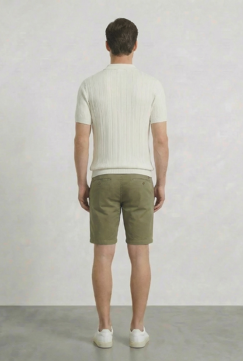 Back image of a model wearing Deep colin zip polo in white, by brand Deep
