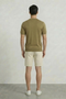 Back image of a model wearing the Deep connor round neck knit in khaki, by brand Deep