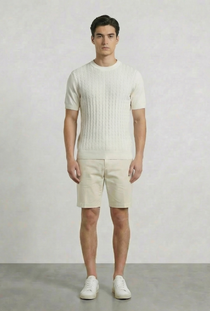 Front image of a model wearing the Deep connor round neck knit in white, by brand Deep
