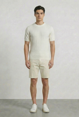 Front image of a model wearing the Deep connor round neck knit in white, by brand Deep