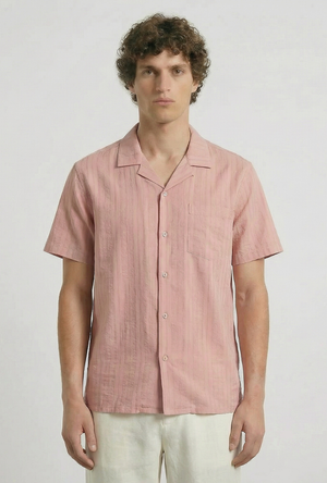 Front image of a model wearing the Deep fusion resort shirt in light pink, by brand Deep