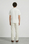 Back image of a model wearing the Deep fusion resort shirt in white, by brand Deep