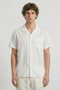 Front image of a model wearing the Deep fusion resort shirt in white, by brand Deep