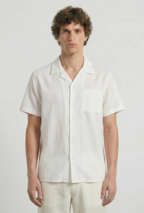 Front image of a model wearing the Deep fusion resort shirt in white, by brand Deep