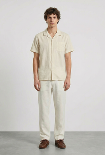 Front image of a model wearing the Deep fusion resort shirt in yellow, by brand Deep