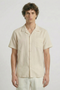 Front image of a model wearing the Deep fusion resort shirt in yellow, by brand Deep