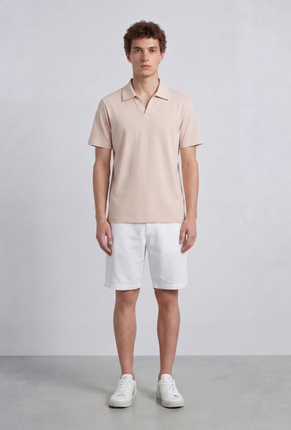 Front image of a model wearing Deep leroy polo in peach, by brand Deep