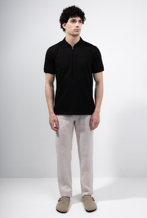 Back image of a model wearing the Deep premium polo in black, by brand Deep