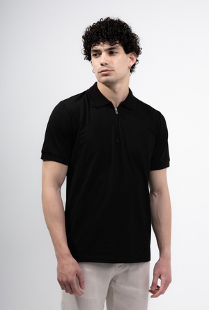 Front image of a model wearing the Deep premium polo in black, by brand Deep