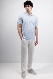 Front image of a model wearing the Deep premium polo in blue, by brand Deep