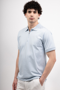 Front image of a model wearing the Deep premium polo in blue, by brand Deep