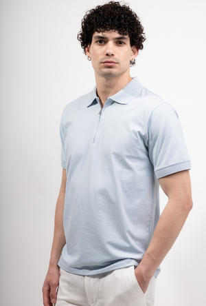 Front image of a model wearing the Deep premium polo in blue, by brand Deep