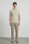 Front image of a model wearing Deep rex crew neck rib knit in beige, by brand Deep