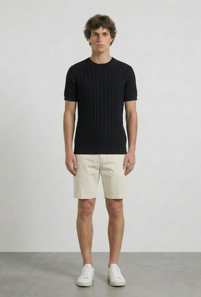 Front image of a model wearing Deep rex crew neck rib knit in black, by brand Deep