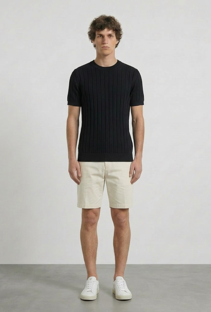 Front image of a model wearing Deep rex crew neck rib knit in black, by brand Deep