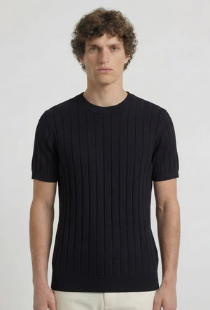 Front image of a model wearing the Deep rex crew neck rib knit in black, by brand Deep