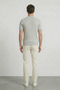 Back image of a model wearing the Deep rex crew neck rib knit in light grey, by brand Deep