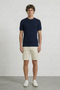 Front image of a model wearing Deep rex crew neck rib knit in navy, by brand Deep