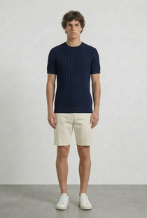 Front image of a model wearing the Deep rex crew neck rib knit in navy, by brand Deep