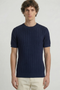 Front image of a model wearing the Deep rex crew neck rib knit in navy, by brand Deep