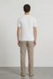 Back image of a model wearing the Deep rex crew neck rib knit in white, by brand Deep