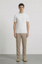 Front image of a model wearing Deep rex crew neck rib knit in white, by brand Deep