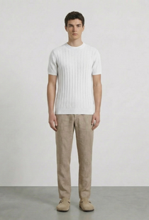 Front image of a model wearing the Deep rex crew neck rib knit in white, by brand Deep