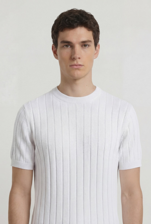 Front image of a model wearing the Deep rex crew neck rib knit in white, by brand Deep