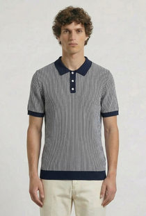 Front image of a model wearing the Deep riley stripe polo in navy, by brand Deep