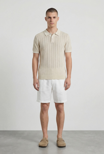 Front image of a model wearing the Deep river button knit polo in beige, by brand Deep
