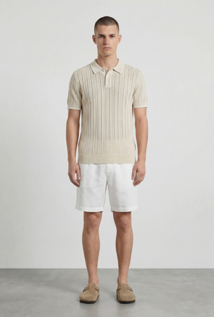 Front image of a model wearing the Deep river button knit polo in beige, by brand Deep
