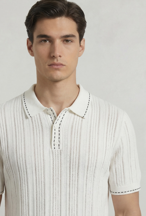 Front image of a model wearing the Deep river button knit polo in white, by brand Deep