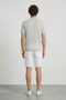 Back image of a model wearing the Deep rocco open neck polo in light grey, by brand Deep