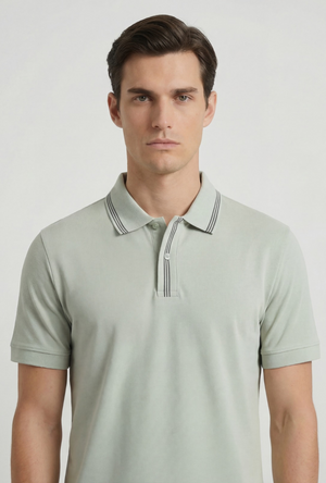 Front image of a model wearing the Deep roman button polo in light green, by brand Deep