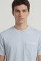 Front image of a model wearing the Deep ronan round neck tshirt in light blue, by brand Deep
