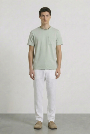 Front image of a model wearing the Deep ronan round neck tshirt in light green, by brand Deep