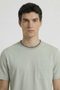 Front image of a model wearing the Deep ronan round neck tshirt in light green, by brand Deep