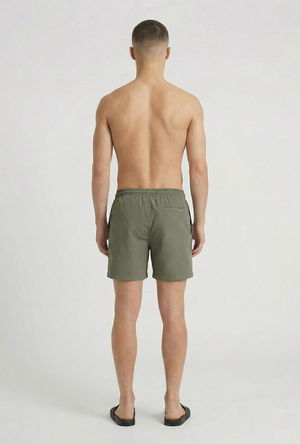 Back image of a model wearing the Deep sharky swimshorts in khaki, by brand Deep